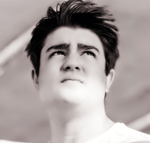 This image contains a picture of Kyriakos (Kai) Dodson